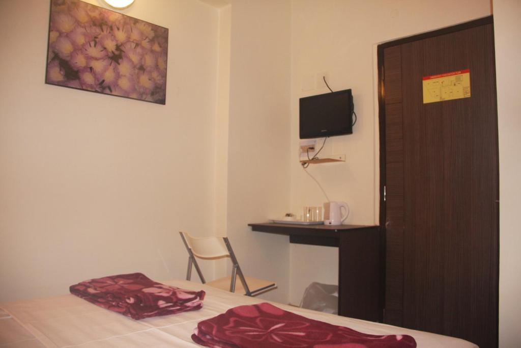 ดาวน์ทาวน์เกสท์เฮาส์ Hotel โกลกาตา ห้อง รูปภาพ